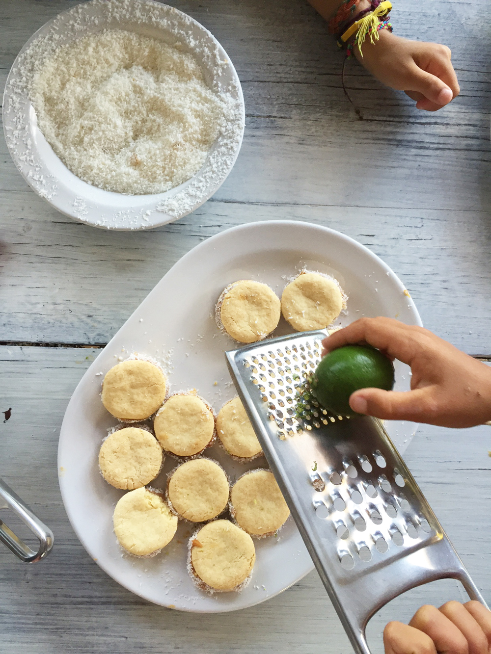 grating lime on alfajores