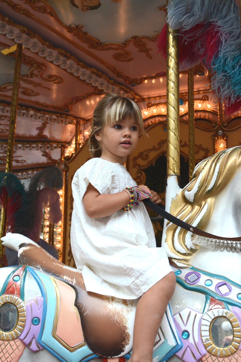 Marlow on carrousel in Florence