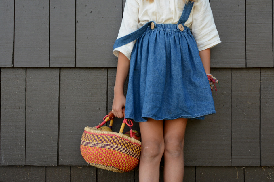 Ivy holding basket of apples